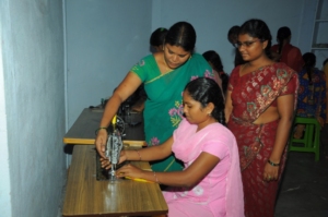 Adolescent girl is practicing on sewing machine