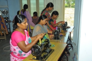 Women are practicing on Sewing machines
