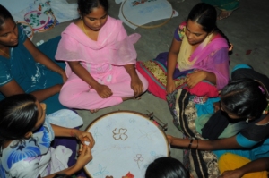Ladies are learning Designing work on cloths