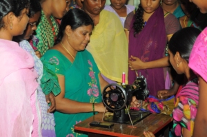 Adolescents are learning on Sewing machine.
