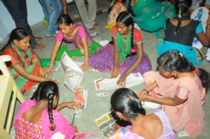Adolescent girls are practicing cloths cutting