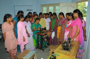 Instructor is teaching cloths stitching on machine