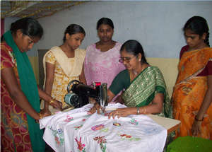 Girls learning hand embroidery