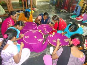 Trainees in Fashion Designing class