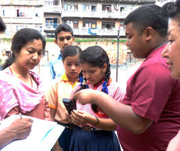 Students Taking GPS Reading of their school