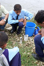 Students conducting test on parameters of water