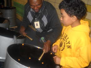 Steel Pan Student With Instructor