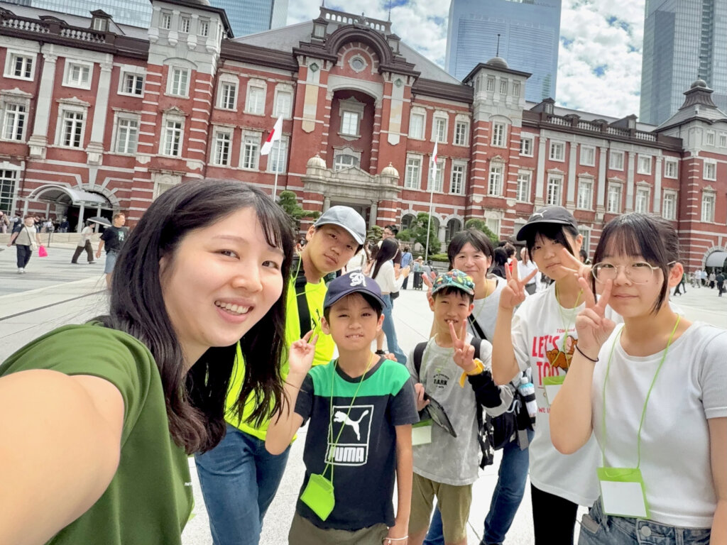 Trying out the game at Tokyo Station
