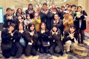 W denotes the university that served as the venue