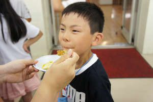 Tasting curry with recipe they invented