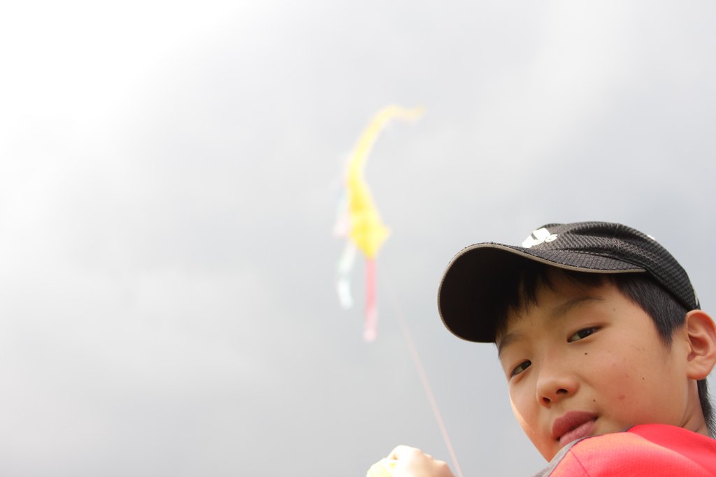 A boy and a kite chain