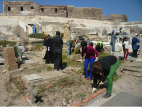 Students help clean the cemetery