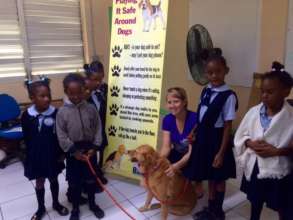 Shelley & dog Harriet educating school children