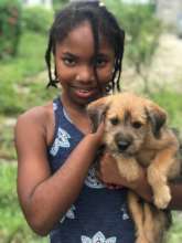 Ava with her puppy Butch and his new collar