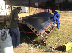 Metal bars prevent the trough shape from twisting.