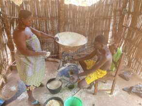 Grinding grain keeps the community food secure