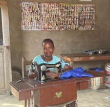 Electric sewing brings a smile to a tailor