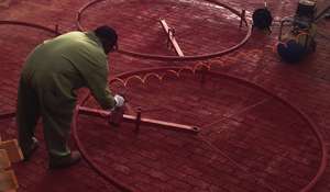 Painting the rings for holding troughs in place