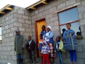 Widow and family at their new home!