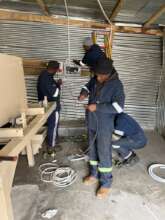 1PWR team installing the mill last year