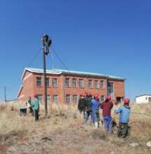 1PWR team stringing wires to customers