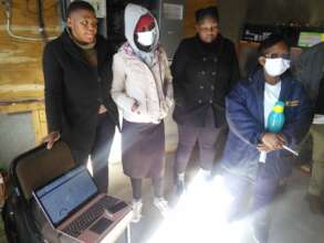 Familiarizing PIH staff with new system, Lebakeng