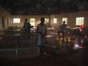 Doing chores!  Our kids cleaning the dining hall.