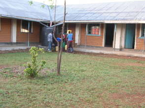 Our school building with veranda and play yard