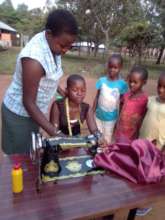 One of our girls learning to sew.