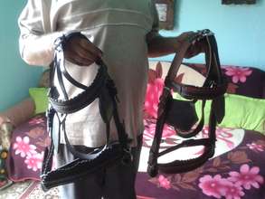 survivors creating leather harnesses