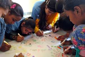 Telling their LitClub story through a hand circle.