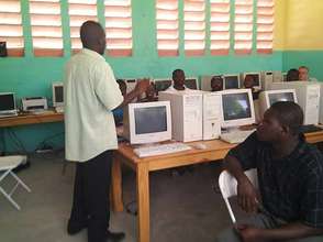 Teacher in computers lab