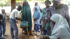 Washing their hands effectively