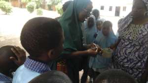 Teaching them to wash hands well