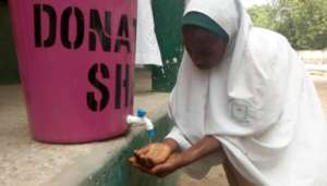 A junior high 3 washing her hands