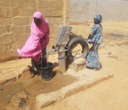 Our girls sourcing from one of the hand pumps