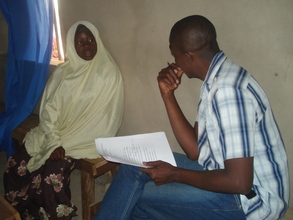 Hauwa answering questions from Programme officer
