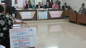 Signs of protest at a city meeting on Belo Monte.