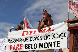 An opposition leader protests against Belo Monte.