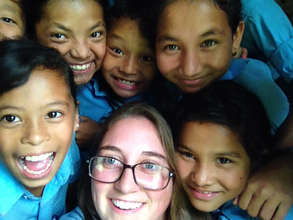 MMW Volunteer, Amanda, with Nepali Children