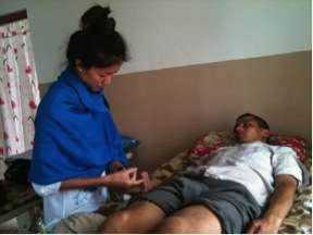 Yan working in the Bhotechaur clinic