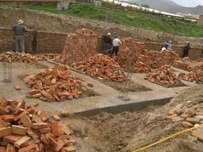 Building the birth center's outer wall