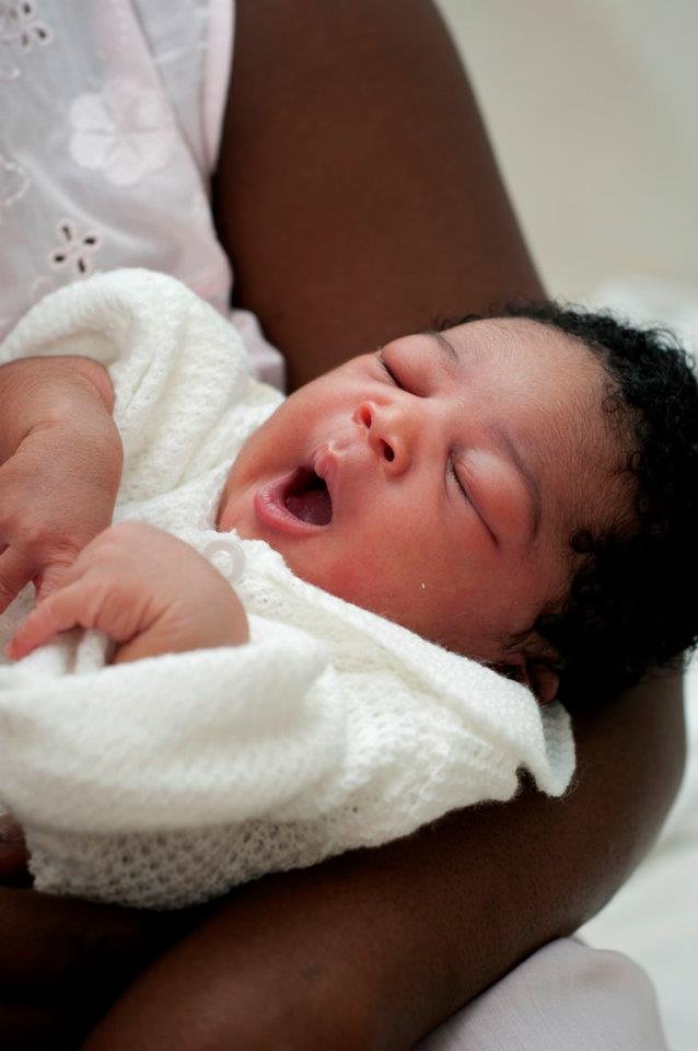 Pay a Haitian midwife's salary for one year at MN
