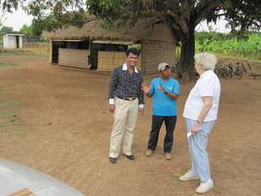 Dr. Hendrie & Elephant speak with the local man in charge.