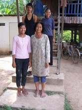 Lun Vandy (pink shirt), English language student, with her famil