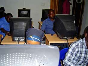 Beneficiaries learning how to operate the computer