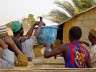 Beneficiaries & buyers weighing the fish