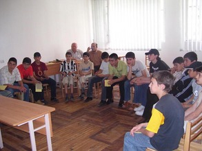 The meeting of the staff, volunteers and the children