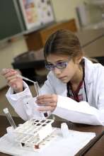 greenlight girl testing out science for herself