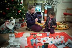 Children decorating Christmas Ornaments